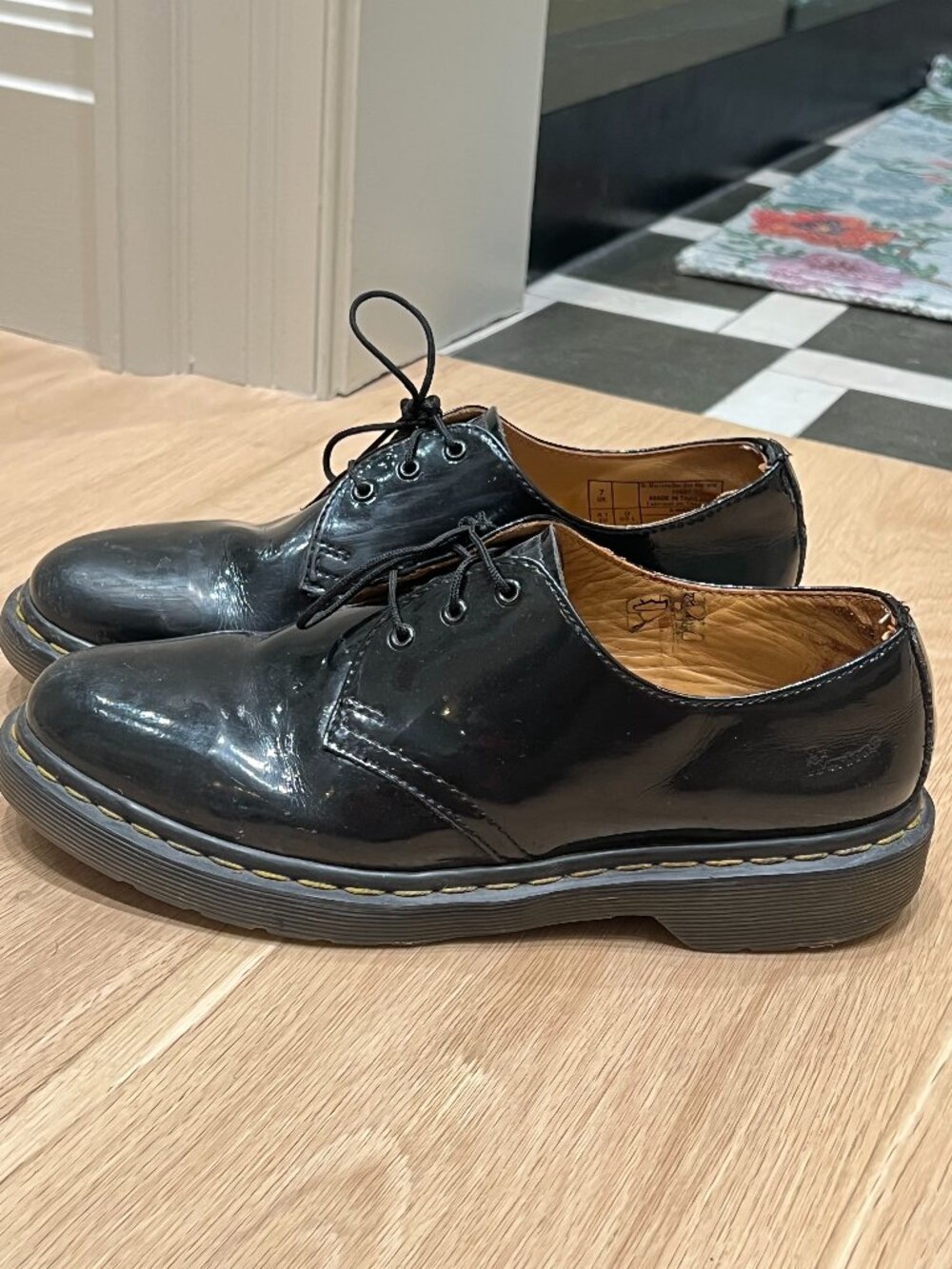 Dr. Martens Black Patent Leather Oxford Loafers.